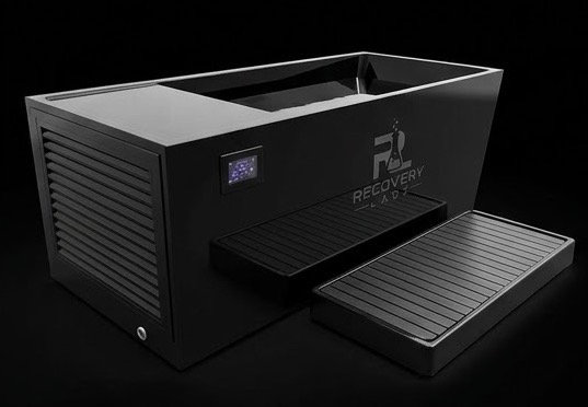Recovery Labz Smart Plunge 1.0 cold plunge in matte black, three-quarter view showing the chiller housing and the moulded step